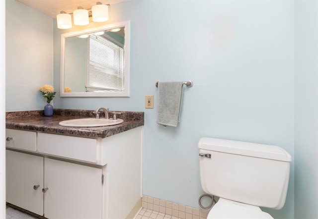 8786 Primrose Ln, Clive, IA 50325 - half bathroom with vanity and toilet