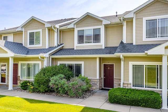 2240 Hart Ave Unit 4, Des Moines, IA 50320 - view of front of house with roof with shingles and stone siding