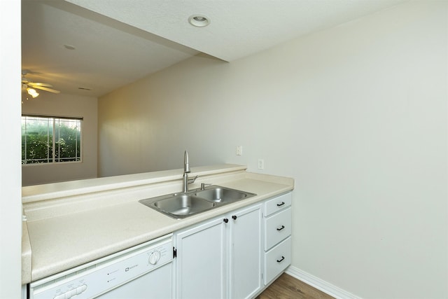 2240 Hart Ave Unit 4, Des Moines, IA 50320 - kitchen featuring dishwasher, light countertops, wood finished floors, ceiling fan, and white cabinets