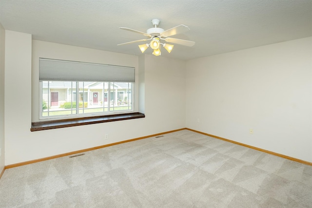2240 Hart Ave Unit 4, Des Moines, IA 50320 - unfurnished room featuring light colored carpet and ceiling fan