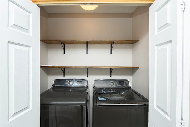 2240 Hart Ave Unit 4, Des Moines, IA 50320 - washroom with washer and clothes dryer