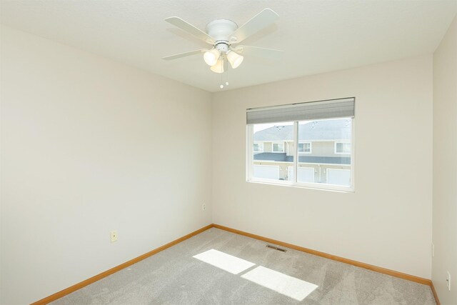 2240 Hart Ave Unit 4, Des Moines, IA 50320 - unfurnished room with light carpet and a ceiling fan