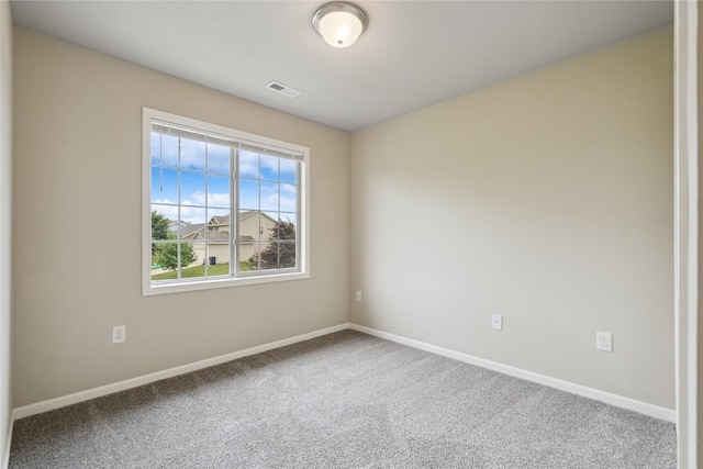 16205 Monroe Ct, Urbandale, IA 50323 - carpeted spare room with baseboards