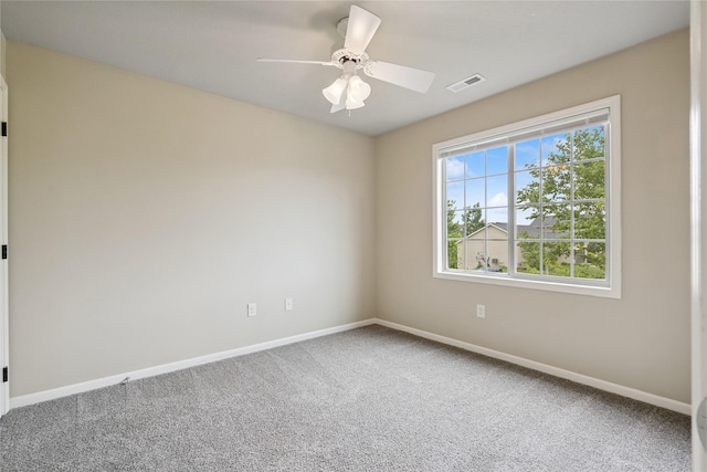 16205 Monroe Ct, Urbandale, IA 50323 - carpeted empty room featuring baseboards and ceiling fan