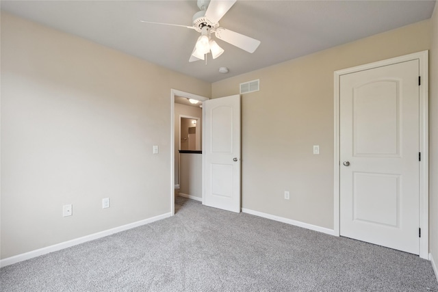 16205 Monroe Ct, Urbandale, IA 50323 - unfurnished bedroom with carpet and a ceiling fan