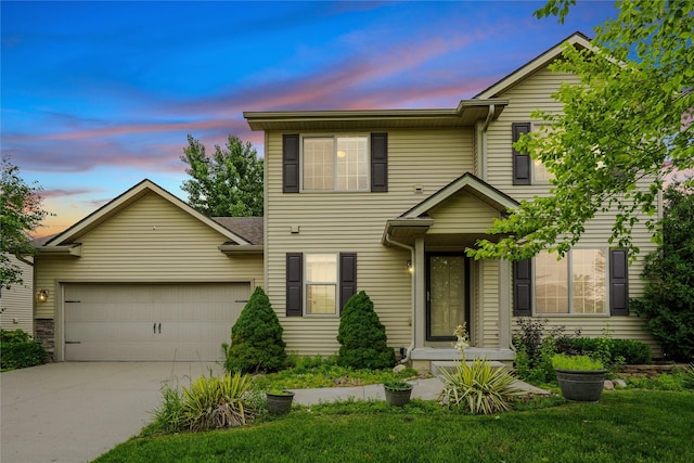 16205 Monroe Ct, Urbandale, IA 50323 - traditional-style home with an attached garage, concrete driveway, and a front yard