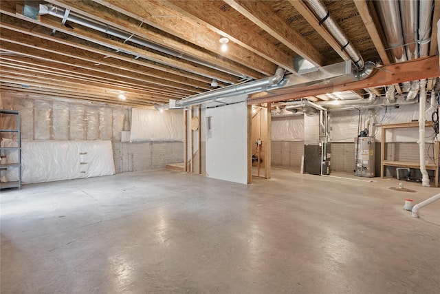 16205 Monroe Ct, Urbandale, IA 50323 - unfinished below grade area featuring gas water heater and heating unit