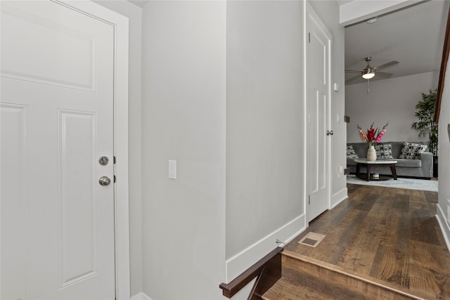 4669 171st St, Urbandale, IA 50323 - hallway featuring wood finished floors and baseboards