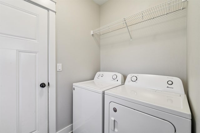 14335 Holcomb Ave, Urbandale, IA 50323 - laundry room featuring independent washer and dryer