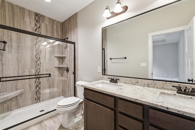 14335 Holcomb Ave, Urbandale, IA 50323 - bathroom with a stall shower and double vanity