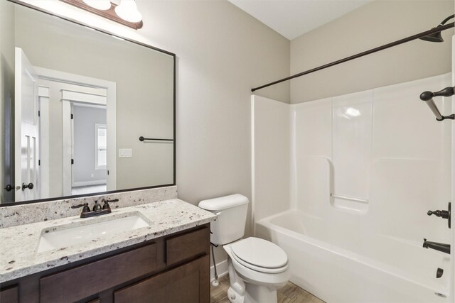 14335 Holcomb Ave, Urbandale, IA 50323 - full bath with vanity,  shower combination, and wood finished floors