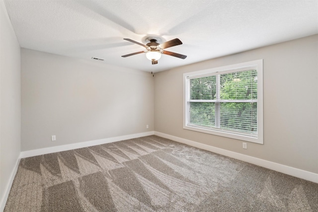 14335 Holcomb Ave, Urbandale, IA 50323 - spare room with carpet floors and a ceiling fan
