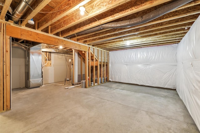 14335 Holcomb Ave, Urbandale, IA 50323 - unfinished below grade area featuring heating unit