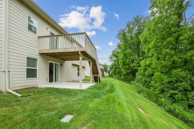 14335 Holcomb Ave, Urbandale, IA 50323 - view of grassy yard with a patio, a deck, and stairs