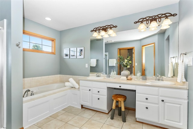 1201 NW Norton St, Grimes, IA 50111 - bathroom with double vanity, tile patterned flooring, and a garden tub