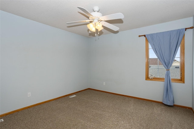 1201 NW Norton St, Grimes, IA 50111 - carpeted empty room with baseboards and a ceiling fan