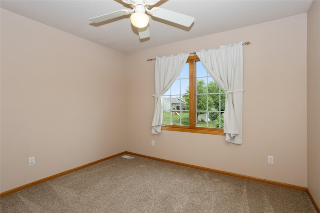 1201 NW Norton St, Grimes, IA 50111 - carpeted empty room featuring baseboards and ceiling fan