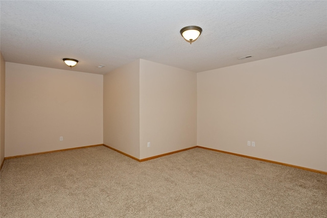 1201 NW Norton St, Grimes, IA 50111 - empty room with light carpet and a textured ceiling