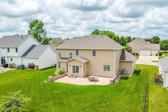1201 NW Norton St, Grimes, IA 50111 - rear view of house with a patio area, a lawn, a residential view, and roof with shingles