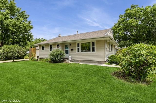3709 Aurora Ave, Des Moines, IA 50310 - ranch-style house featuring a front yard and a chimney