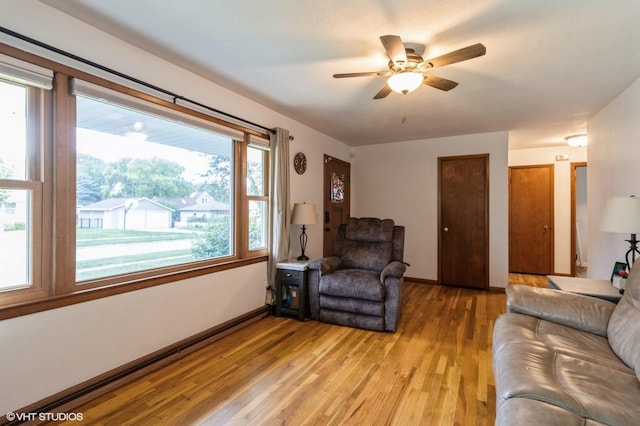 3709 Aurora Ave, Des Moines, IA 50310 - living area featuring ceiling fan and light wood finished floors