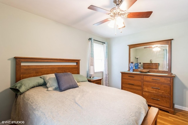 3709 Aurora Ave, Des Moines, IA 50310 - bedroom with light wood-style flooring and ceiling fan