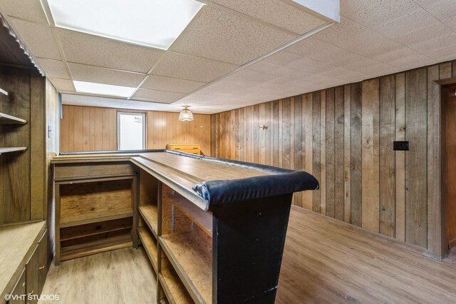 3709 Aurora Ave, Des Moines, IA 50310 - bar with wood finished floors, wood walls, and a paneled ceiling