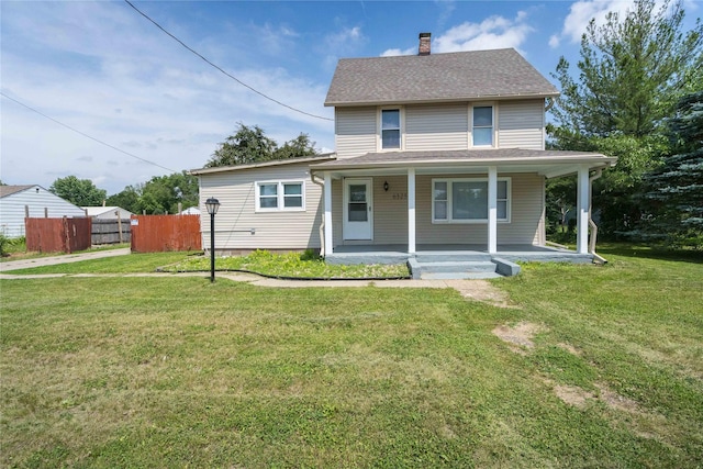 6325 NW 56th St, Johnston, IA 50131 - view of front of house featuring a chimney and a porch