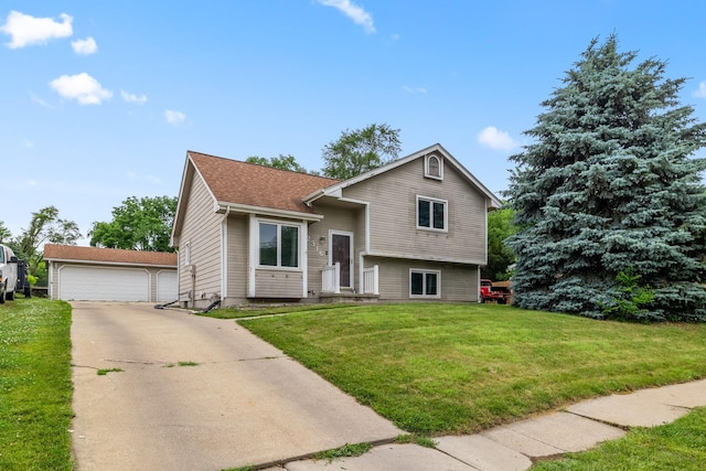 2316 SE 17th St, Des Moines, IA 50320 - split level home featuring a front yard and a garage