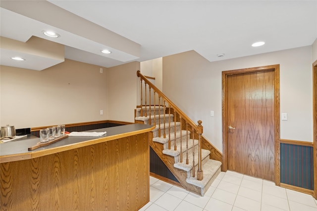 8001 Sheridan Dr, Urbandale, IA 50322 - bar with stairs, recessed lighting, and light tile patterned flooring