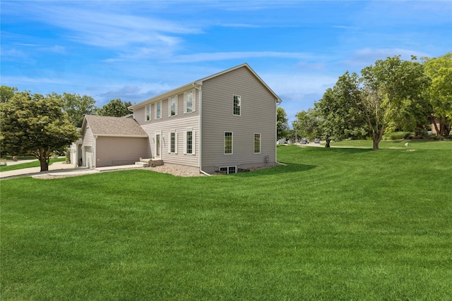 8001 Sheridan Dr, Urbandale, IA 50322 - view of home's exterior featuring a lawn and an outbuilding