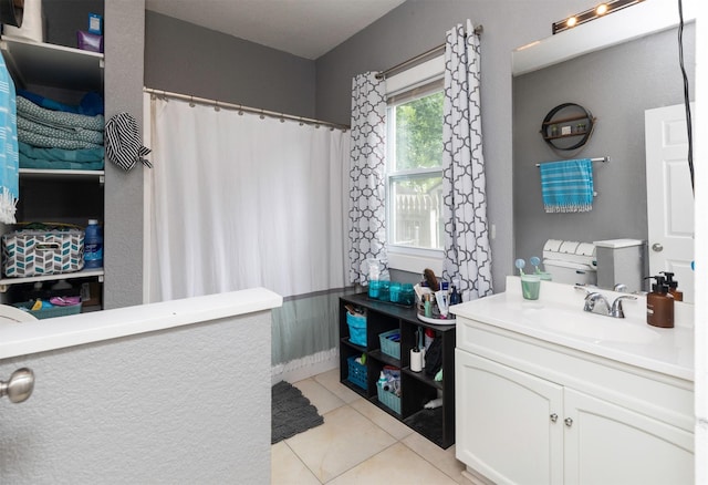 420 9th St, West Des Moines, IA 50265 - bathroom with vanity, tile patterned floors, and a shower with shower curtain
