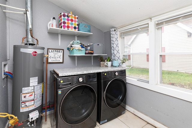 420 9th St, West Des Moines, IA 50265 - laundry area featuring water heater, separate washer and dryer, and light tile patterned floors