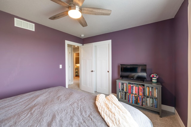 1504 NE Savana Dr, Grimes, IA 50111 - bedroom with carpet floors, ceiling fan, and a closet