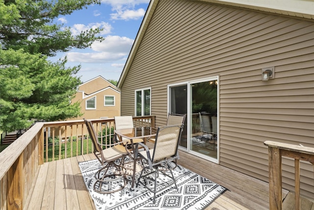 8113 Hammontree Cir, Urbandale, IA 50322 - wooden terrace featuring outdoor dining space