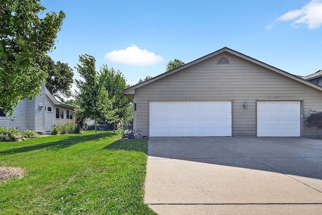 4719 84th St Unit A, Urbandale, IA 50322 - garage featuring driveway