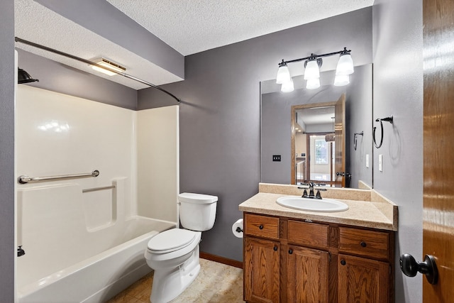 4719 84th St Unit A, Urbandale, IA 50322 - bathroom featuring vanity, a textured ceiling, shower / washtub combination, and tile patterned flooring