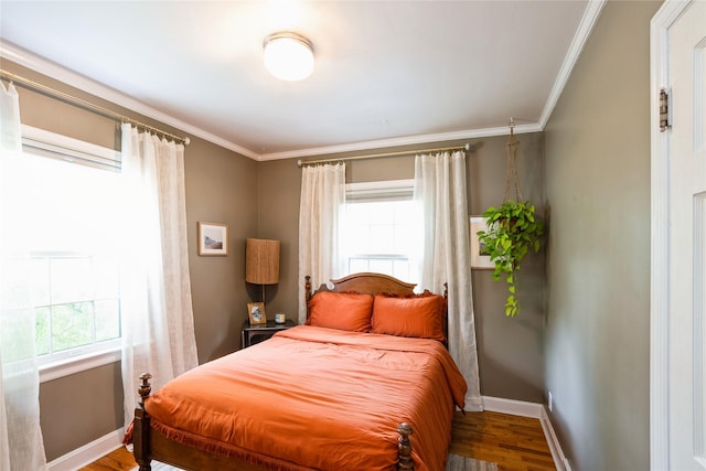 2625 38th St, Des Moines, IA 50310 - bedroom with crown molding and wood finished floors