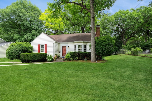 2625 38th St, Des Moines, IA 50310 - view of front of house with a chimney
