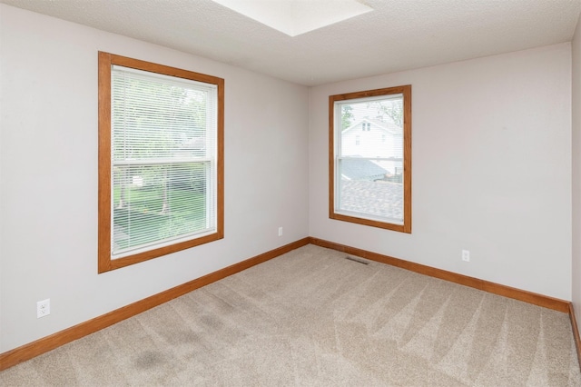 3948 43rd St, Des Moines, IA 50310 - carpeted spare room featuring baseboards