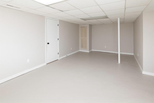 3948 43rd St, Des Moines, IA 50310 - finished below grade area with baseboards and a drop ceiling