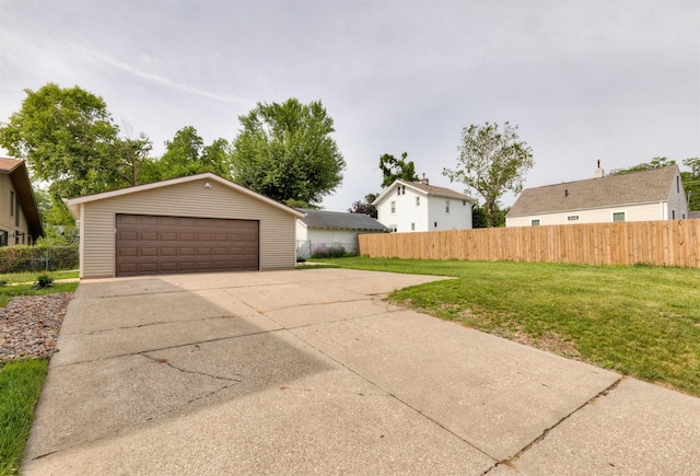 3948 43rd St, Des Moines, IA 50310 - view of front facade featuring a detached garage and an outdoor structure