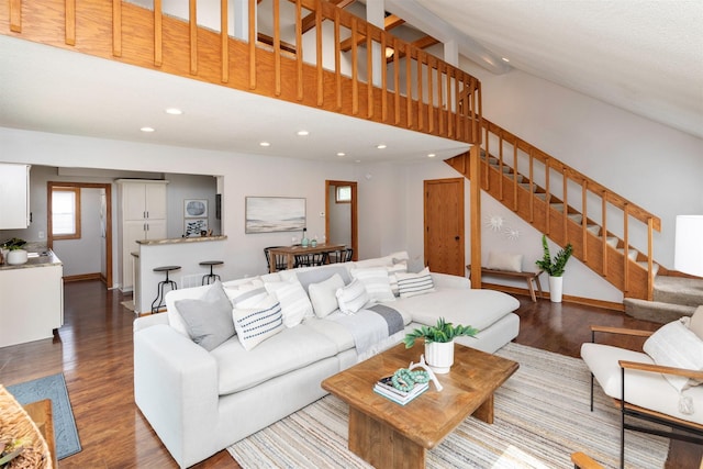 3948 43rd St, Des Moines, IA 50310 - living room featuring stairway, wood finished floors, recessed lighting, and high vaulted ceiling