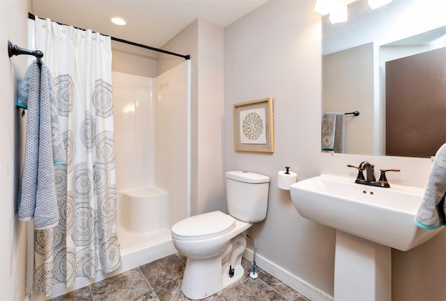 3948 43rd St, Des Moines, IA 50310 - bathroom featuring a shower with shower curtain and tile patterned flooring