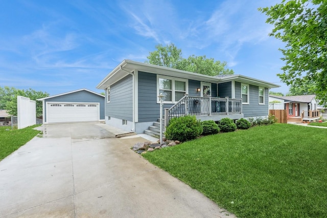 3817 80th St, Urbandale, IA 50322 - single story home featuring an outbuilding, a detached garage, covered porch, and a front lawn