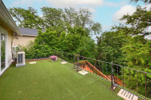 2418 Terrace Rd, Des Moines, IA 50312 - view of green lawn with a balcony