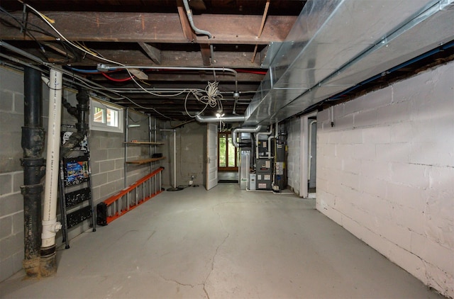 2418 Terrace Rd, Des Moines, IA 50312 - basement with gas water heater and heating unit