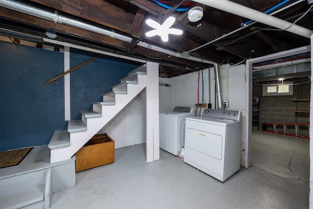 2418 Terrace Rd, Des Moines, IA 50312 - basement featuring washer and clothes dryer and stairs