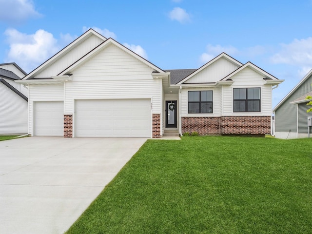 645 NW Prairie Rose Ln, Waukee, IA 50263 - single story home featuring an attached garage, brick siding, a front yard, driveway, and board and batten siding