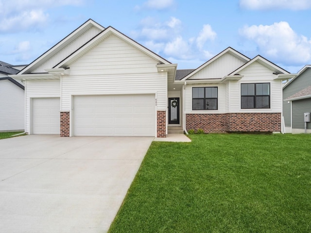 645 NW Prairie Rose Ln, Waukee, IA 50263 - view of front of property with brick siding, an attached garage, a front lawn, concrete driveway, and board and batten siding